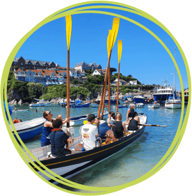 Rowers in Newquay Harbour